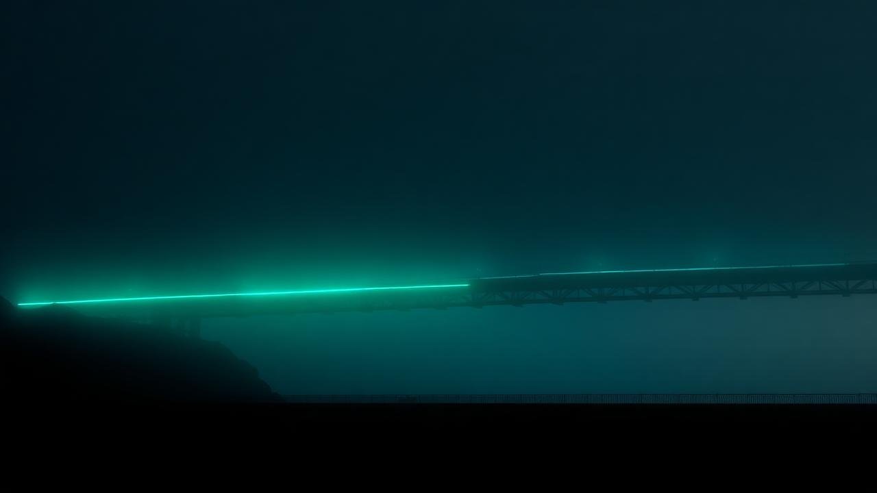 A bridge silhouette lit by a mint line of light in fog